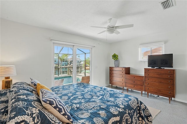2749 Bruce St, Matlacha, FL 33993 - bedroom with access to exterior and a ceiling fan