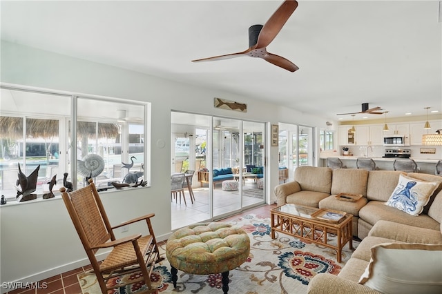 2749 Bruce St, Matlacha, FL 33993 - living room featuring a ceiling fan and light tile patterned floors