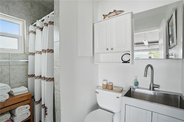 2749 Bruce St, Matlacha, FL 33993 - bathroom featuring vanity, tile walls, and a shower with curtain