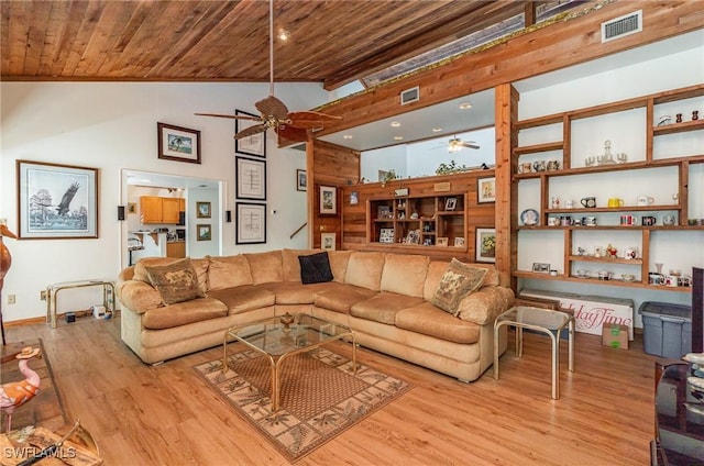 7786 Breakwater Ct, Bokeelia, FL 33922 - living room featuring a ceiling fan, wood ceiling, wood finished floors, and lofted ceiling