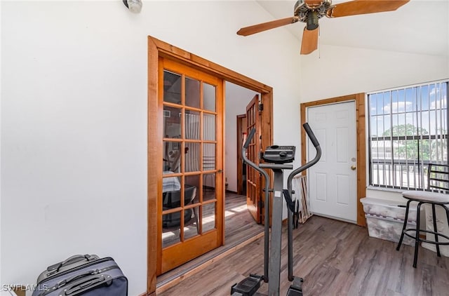7786 Breakwater Ct, Bokeelia, FL 33922 - workout area with lofted ceiling, wood finished floors, and a ceiling fan