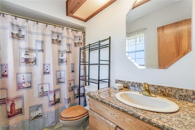 7786 Breakwater Ct, Bokeelia, FL 33922 - full bathroom with vanity and a shower with shower curtain