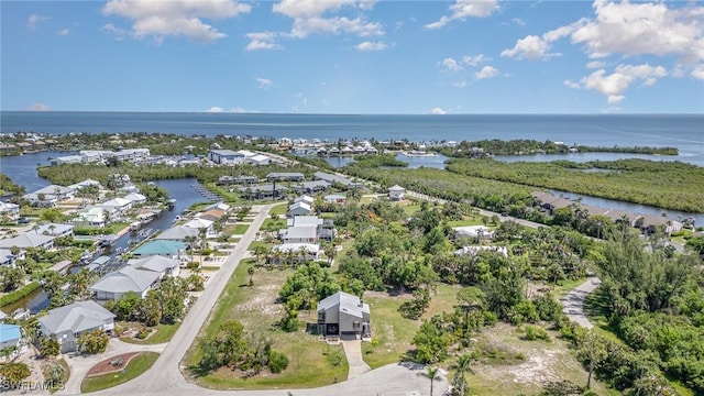 7786 Breakwater Ct, Bokeelia, FL 33922 - aerial perspective of suburban area with a large body of water