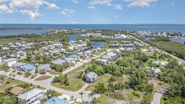 7786 Breakwater Ct, Bokeelia, FL 33922 - aerial perspective of suburban area featuring a large body of water