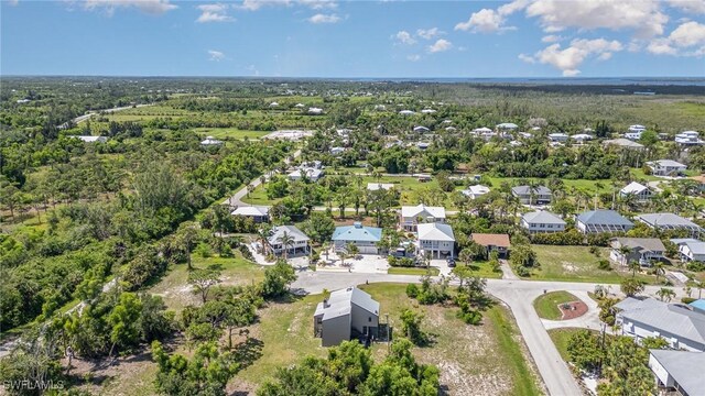 7786 Breakwater Ct, Bokeelia, FL 33922 - aerial overview of property's location featuring nearby suburban area