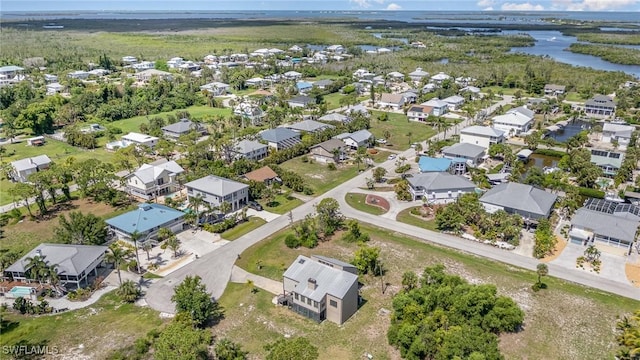 7786 Breakwater Ct, Bokeelia, FL 33922 - aerial perspective of suburban area featuring a nearby body of water