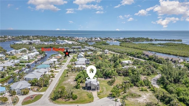 7786 Breakwater Ct, Bokeelia, FL 33922 - aerial view of residential area with a large body of water