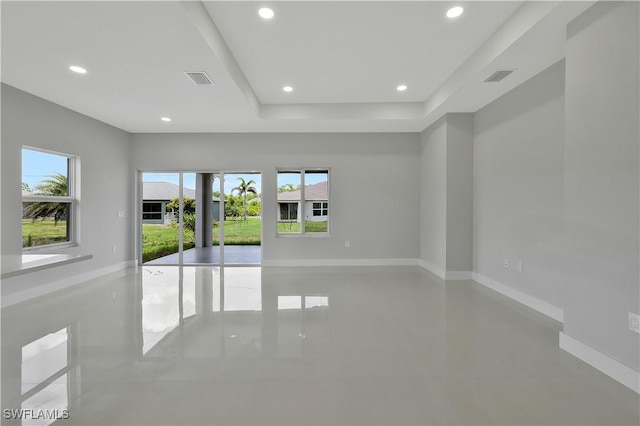 13224 Foresman Blvd, Port Charlotte, FL 33981 - empty room with recessed lighting and a tray ceiling