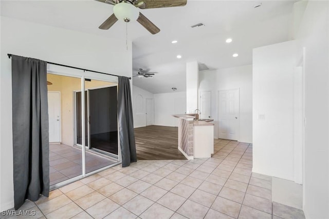 726 SW 12th St, Cape Coral, FL 33991 - unfurnished room featuring a ceiling fan, light tile patterned flooring, recessed lighting, and vaulted ceiling