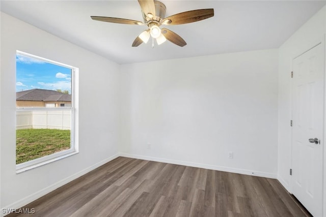 726 SW 12th St, Cape Coral, FL 33991 - empty room with wood finished floors and a ceiling fan