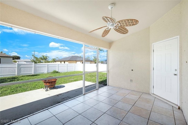 726 SW 12th St, Cape Coral, FL 33991 - unfurnished sunroom featuring ceiling fan