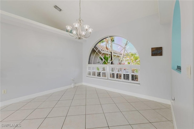 1525 SW 43rd Ter, Cape Coral, FL 33914 - empty room featuring a chandelier and baseboards