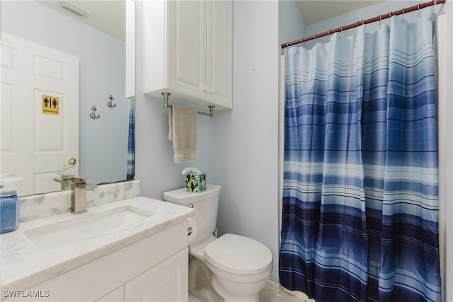 1525 SW 43rd Ter, Cape Coral, FL 33914 - bathroom featuring vanity, toilet, and a shower with curtain