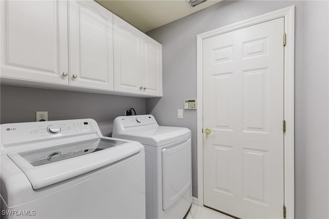 1525 SW 43rd Ter, Cape Coral, FL 33914 - washroom featuring separate washer and dryer and cabinet space