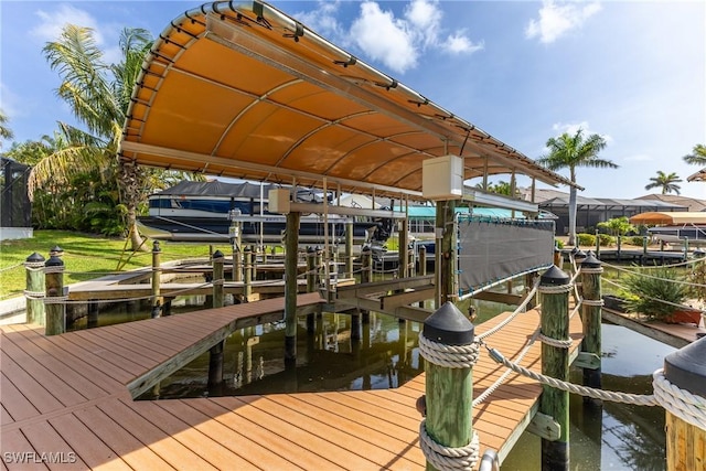 1525 SW 43rd Ter, Cape Coral, FL 33914 - dock featuring boat lift and a water view