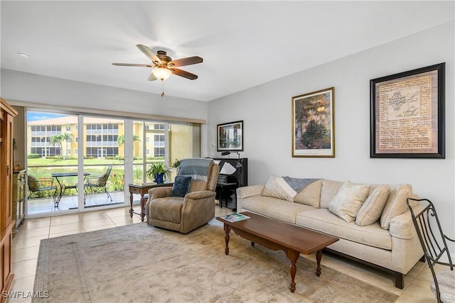 10020 Maddox Ln Unit 113, Bonita Springs, FL 34135 - living room with a ceiling fan and light tile patterned floors