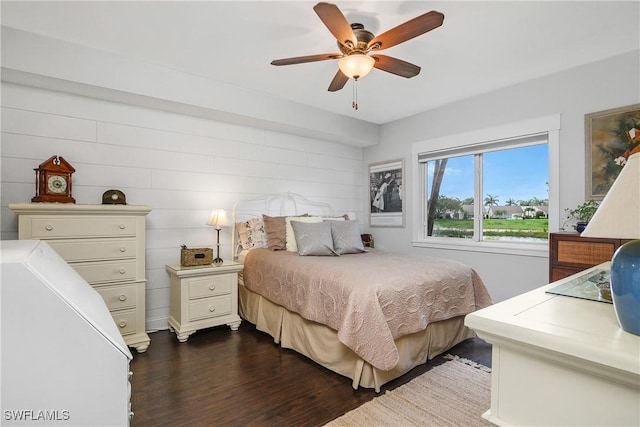 10020 Maddox Ln Unit 113, Bonita Springs, FL 34135 - bedroom featuring dark wood-type flooring and a ceiling fan