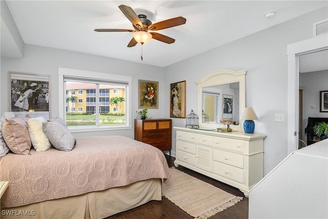 10020 Maddox Ln Unit 113, Bonita Springs, FL 34135 - bedroom featuring wood finished floors and a ceiling fan