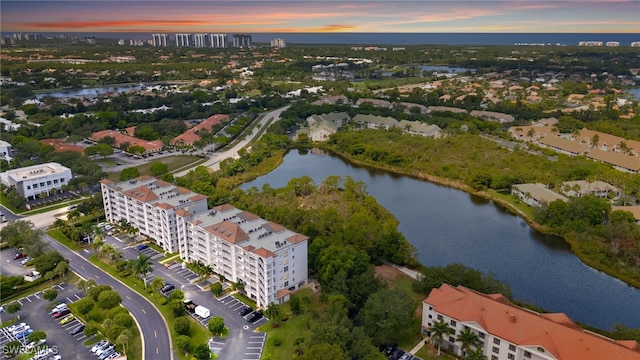 28750 Trails Edge Blvd Unit 303, Bonita Springs, FL 34134 - drone / aerial view of a nearby body of water and apartment complex