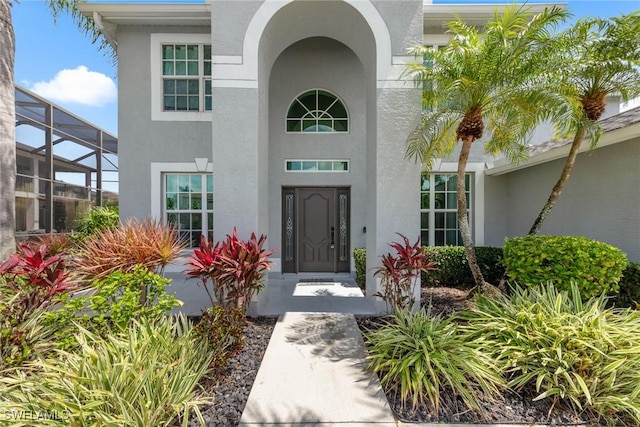 21314 Braxfield Loop, Estero, FL 33928 - doorway to property with stucco siding