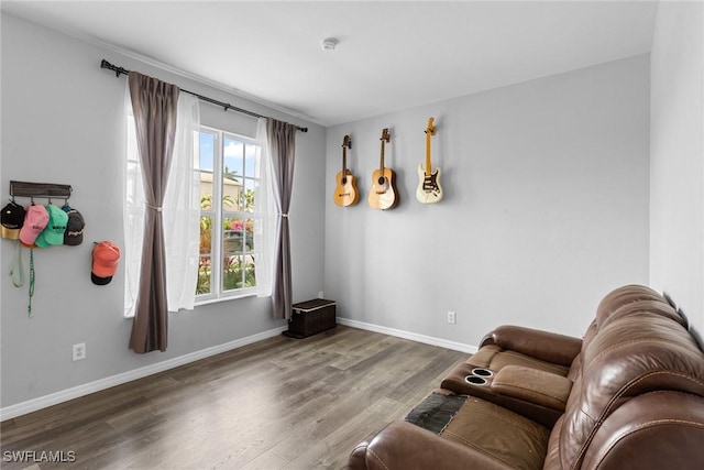 21314 Braxfield Loop, Estero, FL 33928 - living area featuring wood finished floors and baseboards