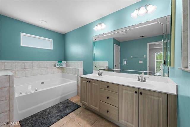 21314 Braxfield Loop, Estero, FL 33928 - bathroom with double vanity, a garden tub, and tile patterned flooring
