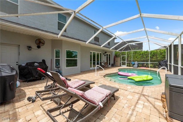 21314 Braxfield Loop, Estero, FL 33928 - swimming pool with a patio area and glass enclosure
