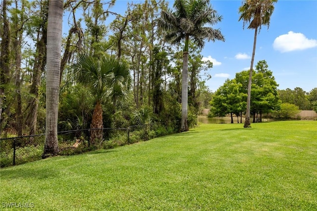 21314 Braxfield Loop, Estero, FL 33928 - view of yard with a water view