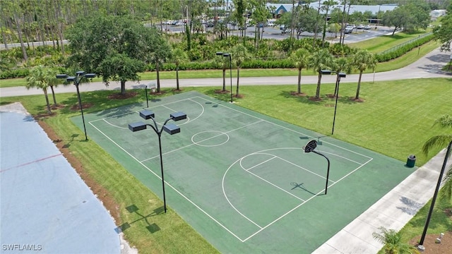21314 Braxfield Loop, Estero, FL 33928 - view of sport court featuring a lawn and community basketball court