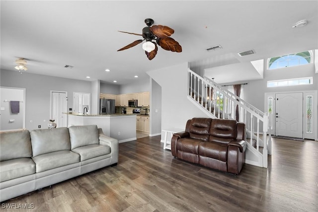 21314 Braxfield Loop, Estero, FL 33928 - living area featuring ceiling fan, stairs, wood finished floors, recessed lighting, and baseboards