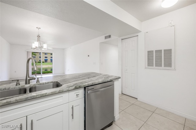 8244 Key Royal Cir Unit 615, Naples, FL 34119 - kitchen with dishwasher, a chandelier, white cabinets, light tile patterned floors, and pendant lighting