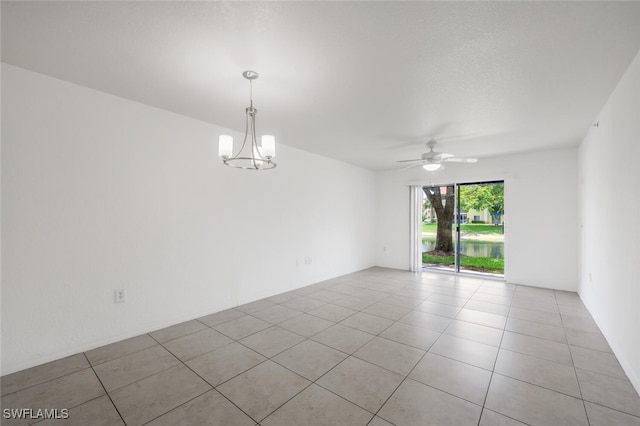 8244 Key Royal Cir Unit 615, Naples, FL 34119 - unfurnished room featuring ceiling fan and light tile patterned flooring