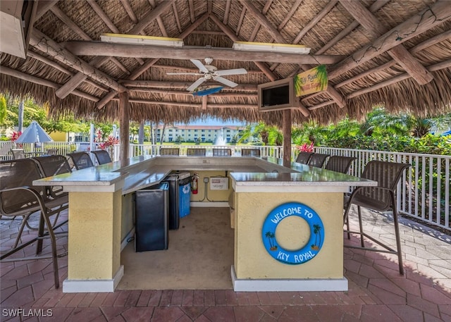 8244 Key Royal Cir Unit 615, Naples, FL 34119 - view of patio / terrace with a gazebo, area for grilling, and a ceiling fan