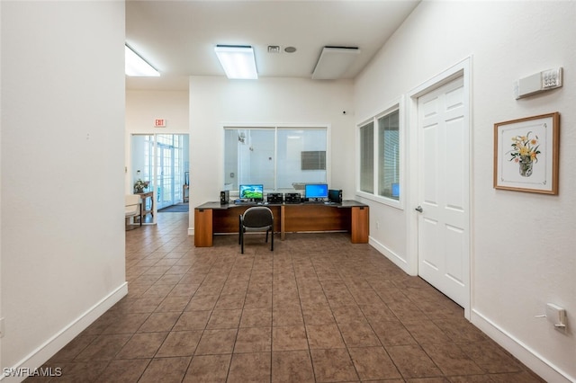 8244 Key Royal Cir Unit 615, Naples, FL 34119 - office with tile patterned floors and baseboards