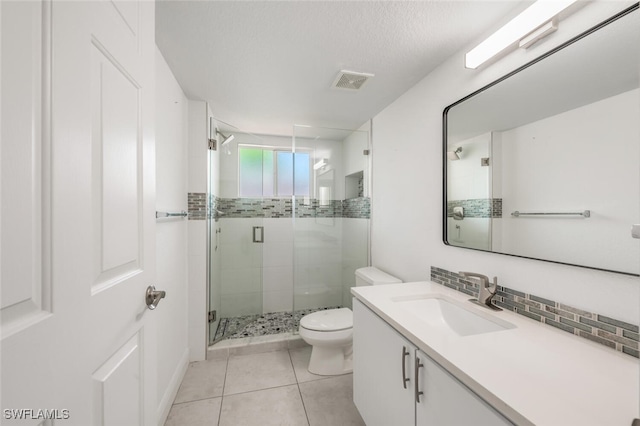 8244 Key Royal Cir Unit 615, Naples, FL 34119 - bathroom featuring a stall shower, vanity, and tile patterned floors