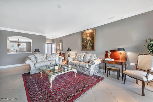 5963 Sand Wedge Ln Unit 203, Naples, FL 34110 - tiled living area with ornamental molding, arched walkways, and a chandelier