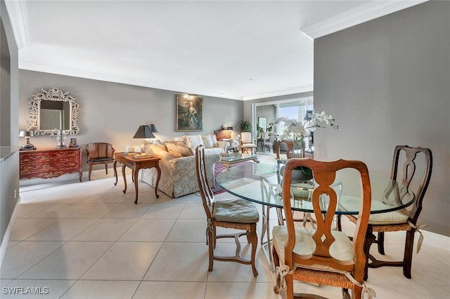 5963 Sand Wedge Ln Unit 203, Naples, FL 34110 - dining space featuring ornamental molding and light tile patterned floors