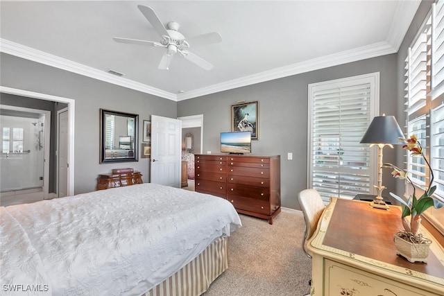 5963 Sand Wedge Ln Unit 203, Naples, FL 34110 - bedroom featuring light carpet, crown molding, a desk, a ceiling fan, and ensuite bath