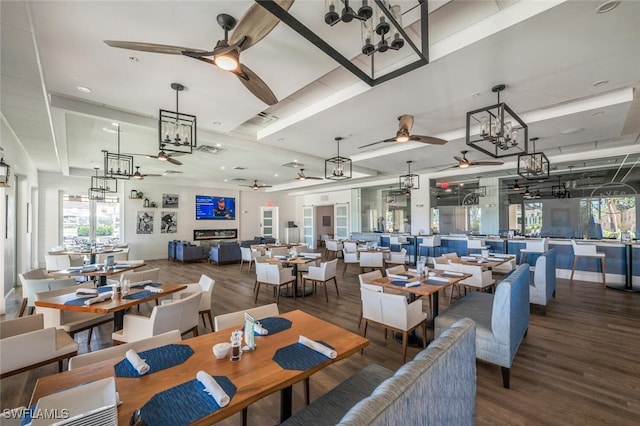 5963 Sand Wedge Ln Unit 203, Naples, FL 34110 - dining room featuring a ceiling fan, wood finished floors, a chandelier, and recessed lighting