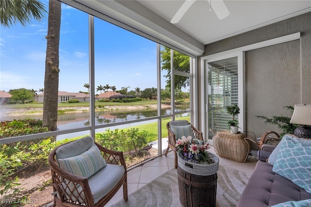 5963 Sand Wedge Ln Unit 203, Naples, FL 34110 - sunroom with a ceiling fan and a water view