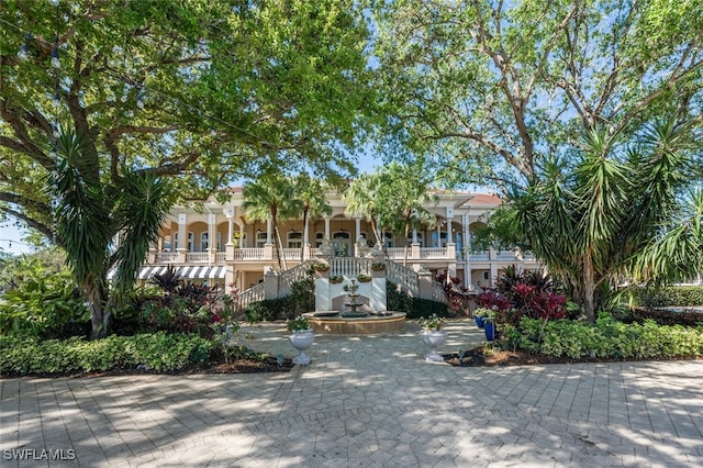 5963 Sand Wedge Ln Unit 203, Naples, FL 34110 - view of community featuring stairs