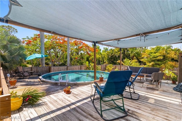 5228 Stringfellow Rd, Saint James City, FL 33956 - view of pool with a fenced backyard and a wooden deck