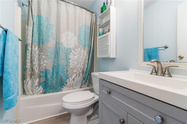 5228 Stringfellow Rd, Saint James City, FL 33956 - full bath featuring vanity, shower / bathtub combination with curtain, and wood finished floors