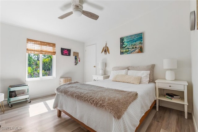 5228 Stringfellow Rd, Saint James City, FL 33956 - bedroom featuring wood finished floors and ceiling fan
