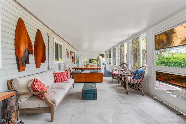 5228 Stringfellow Rd, Saint James City, FL 33956 - sunroom / solarium featuring concrete floors