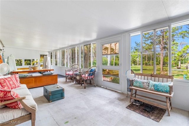 5228 Stringfellow Rd, Saint James City, FL 33956 - sunroom with healthy amount of natural light and unfinished concrete flooring