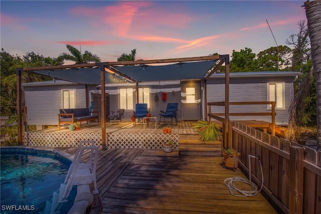 5228 Stringfellow Rd, Saint James City, FL 33956 - wooden deck with an outdoor pool