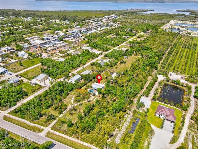 5228 Stringfellow Rd, Saint James City, FL 33956 - aerial overview of property's location featuring a nearby body of water and nearby suburban area