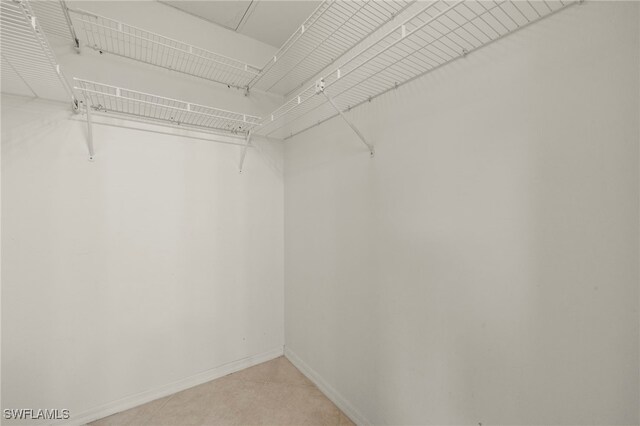 12170 Kelly Sands Way Unit 721, Fort Myers, FL 33908 - spacious closet with light tile patterned floors