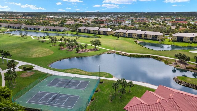12170 Kelly Sands Way Unit 721, Fort Myers, FL 33908 - aerial perspective of suburban area featuring a large body of water and a golf course